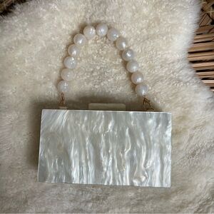 A New Day Shell Clutch Bag